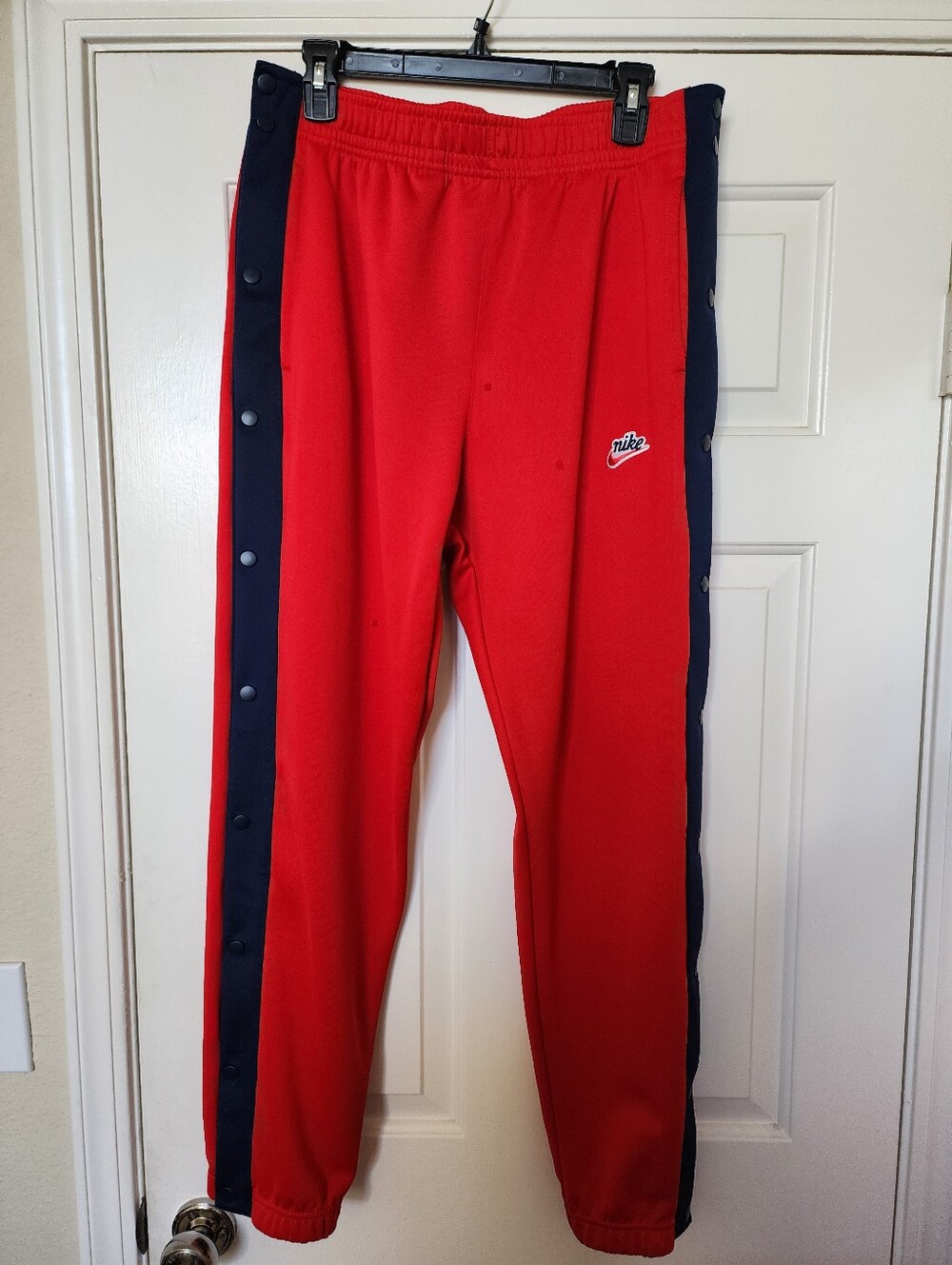 Nike Red Track Pants with Navy Side Stripes